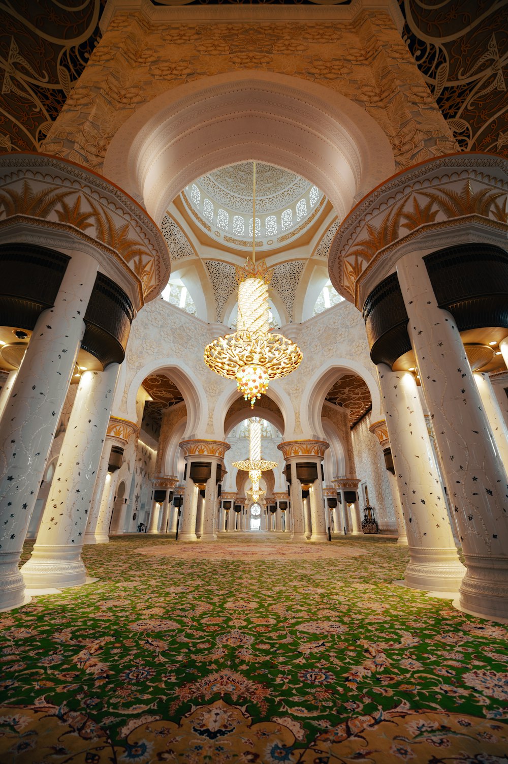 a large room with a chandelier hanging from the ceiling