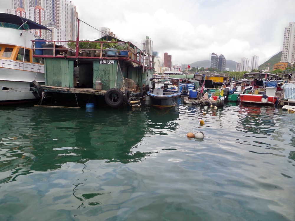 a group of boats that are sitting in the water