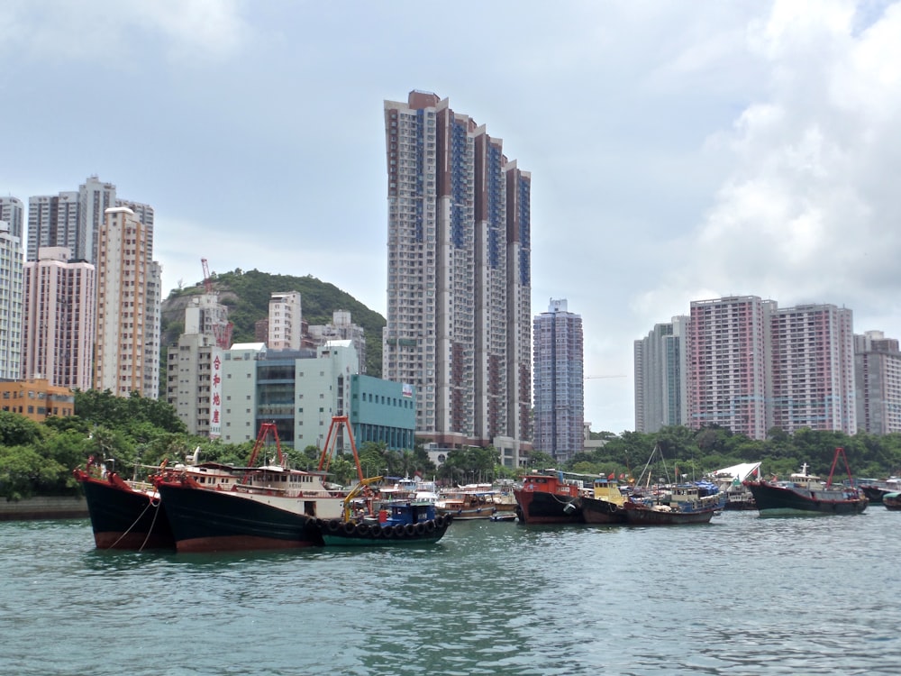 a group of boats that are sitting in the water