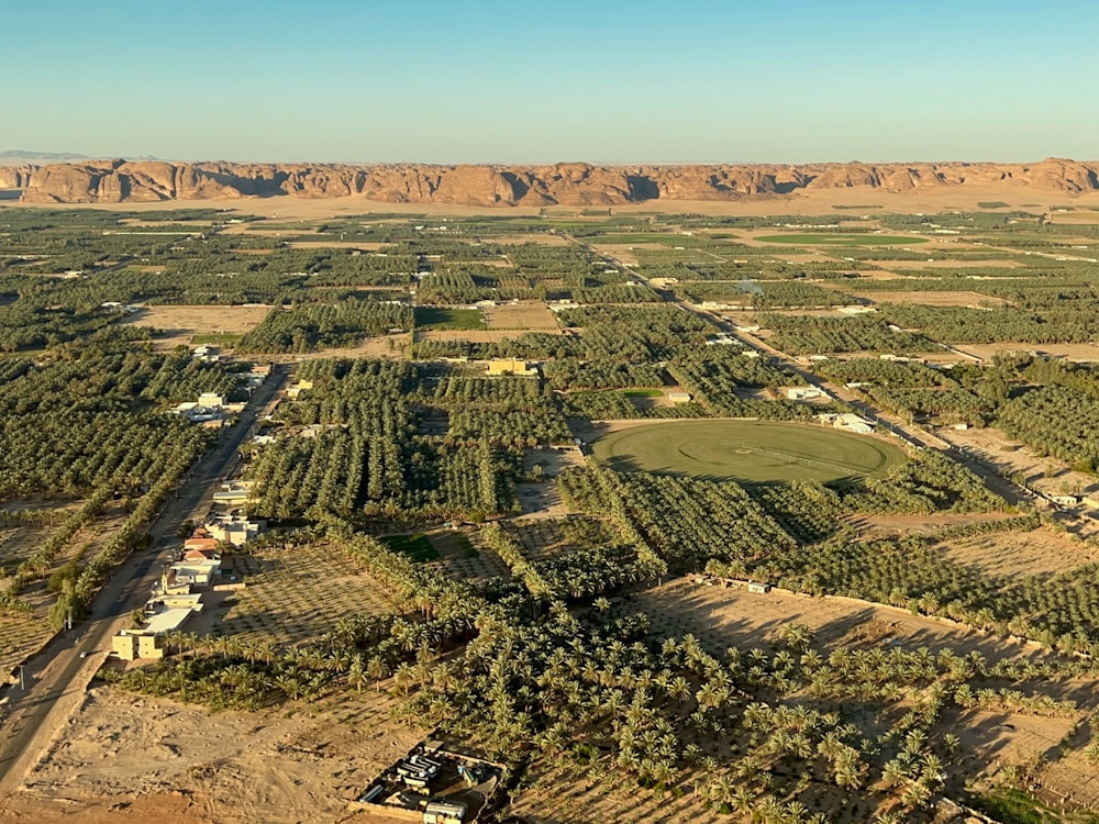 an aerial view of a small town in the desert