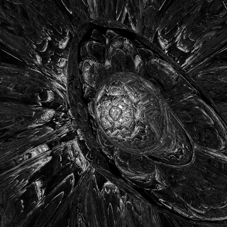 A complex, abstract design featuring intricate, overlapping textures and patterns. The image gives the impression of a three-dimensional crystal or metallic structure with reflective surfaces and dark shading that create a sense of depth.