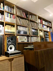 A chic CD storage box on a wooden shelf.