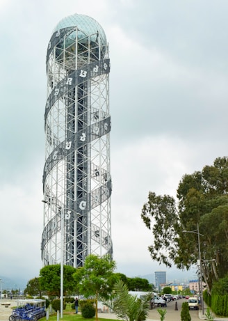 a tall tower with a clock on the side of it