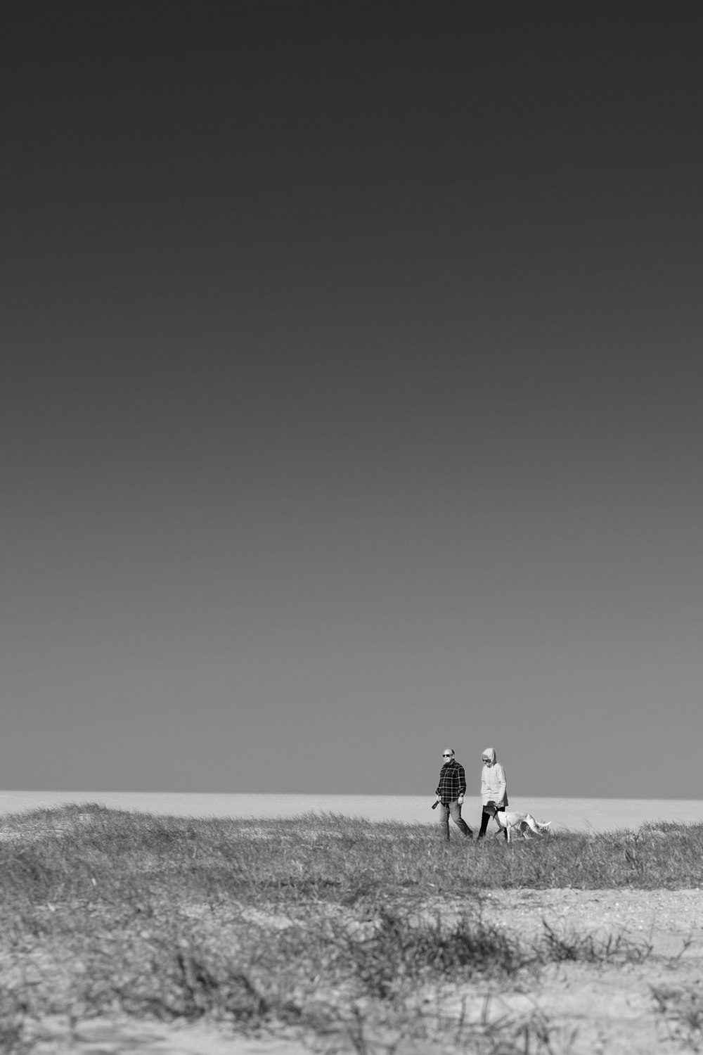 a couple of people riding on the back of a horse