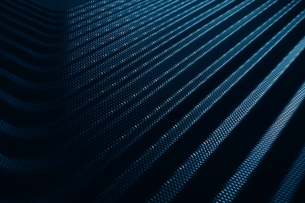 a dark blue background with a wavy pattern