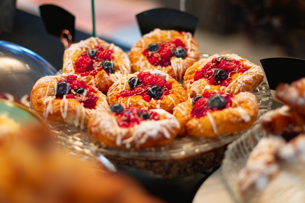 a close up of a plate of pastries on a table