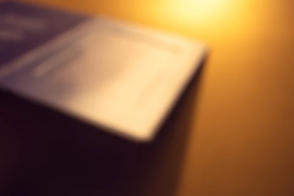 Blurred preview of an upcoming spiritual ebook with soft white and gold hues