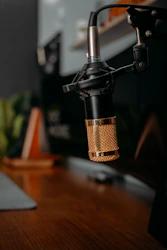 a close up of a microphone on a desk