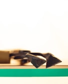 Close-up of shiny hand tools neatly arranged on a wooden display at Bhoomi Enterprises.