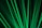 Bright green laser beams shining through a dark background and creating a dynamic, energetic pattern.