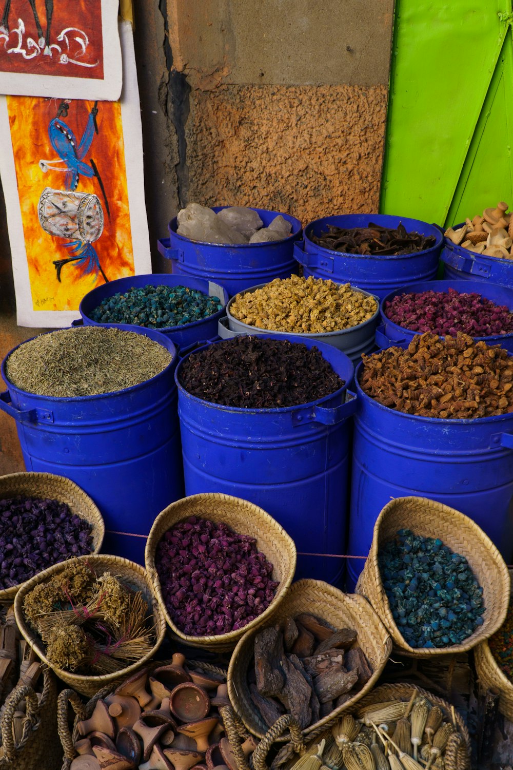 a pile of buckets filled with lots of different types of food