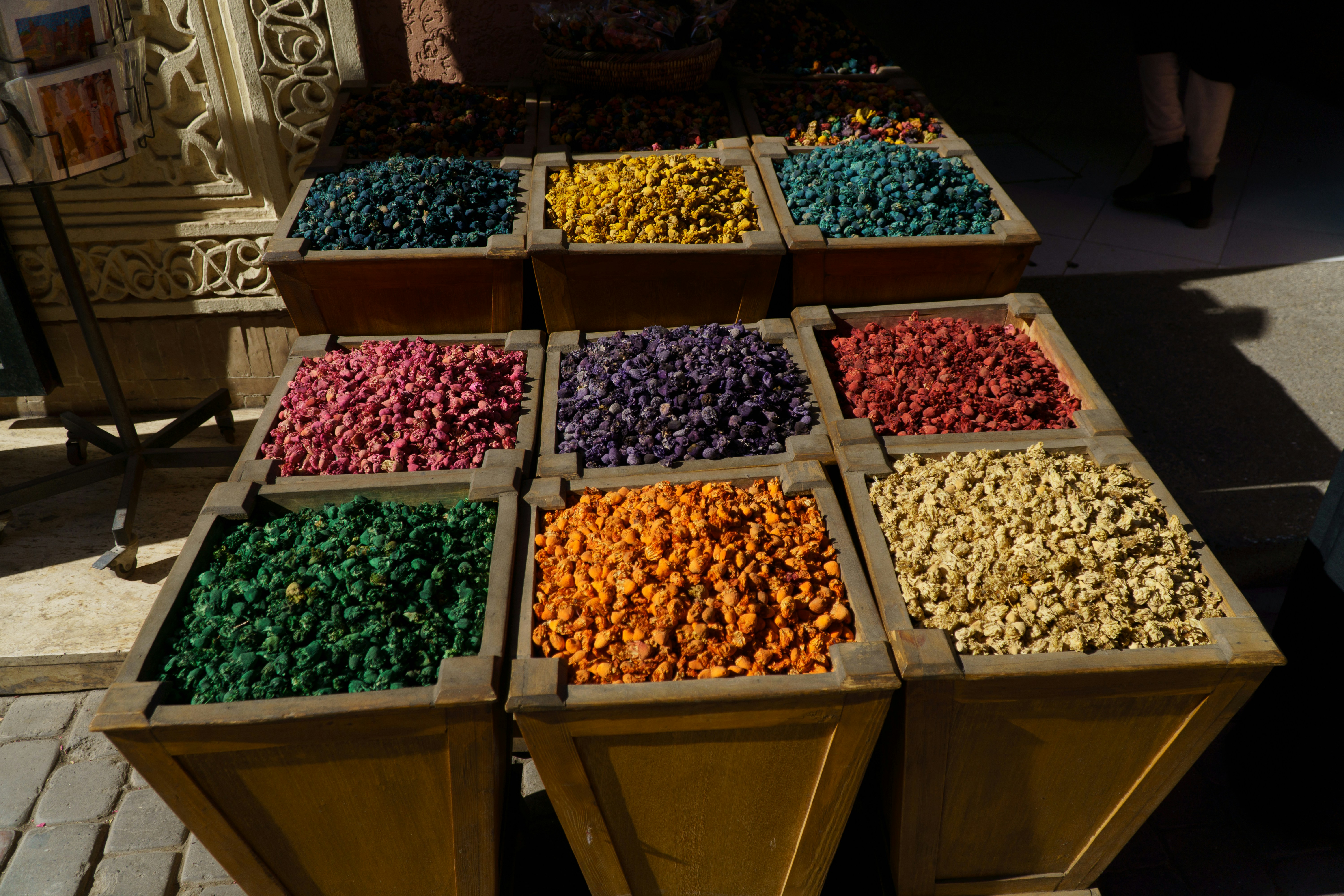Dried herbs and spices in wooden bowls, medicinal plants and herbal extracts for export