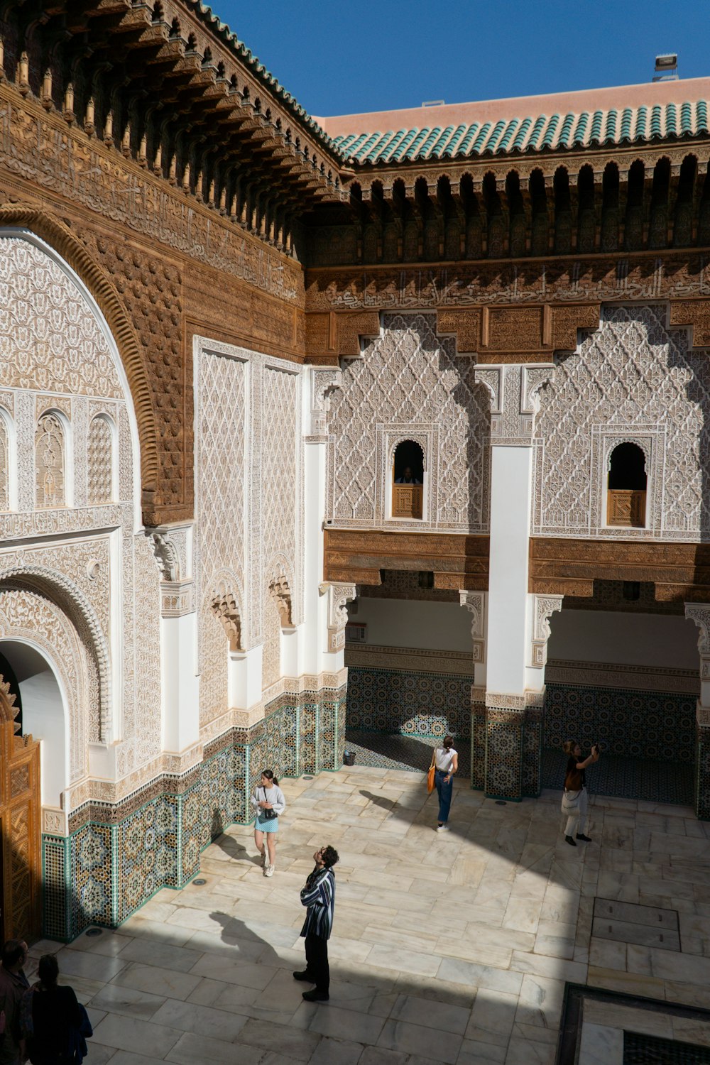 a group of people standing outside of a building