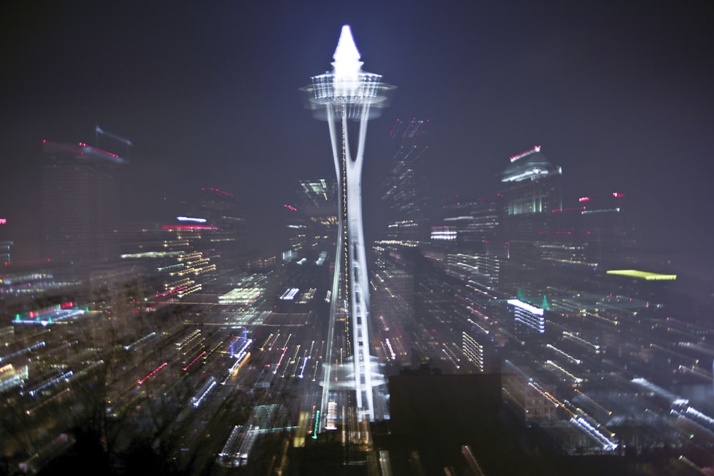 a view of a city at night from the top of a building