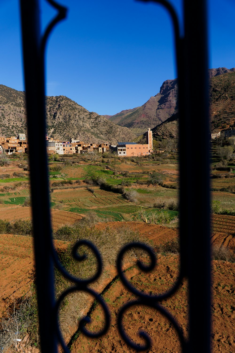 a view of a village through a window