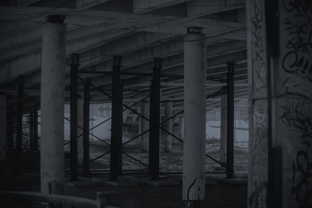 a black and white photo of a building under construction