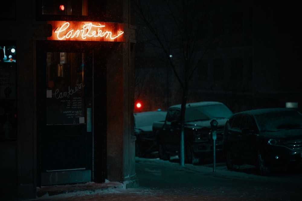 a neon sign on the side of a building