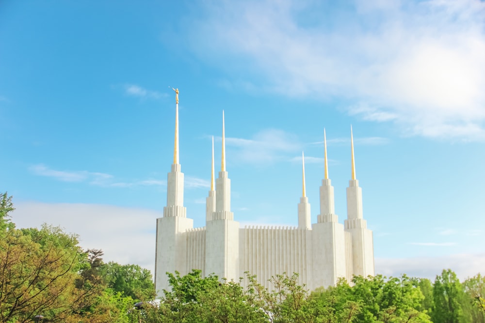 a large white building with spires on top of it