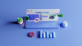 A 3D illustration of a desktop computer setup with a monitor displaying graphs and search icons. Nearby objects include a potted plant, a coffee cup, a magnifying glass, a gear, and a power plug. The scene is set against a monochromatic blue background, emphasizing a digital and modern workspace theme.