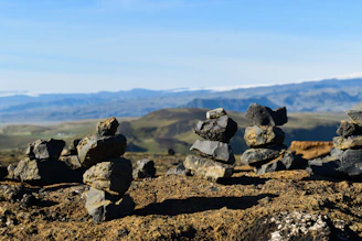 Dolomite rocks stacked in a mining yard under a clear sky