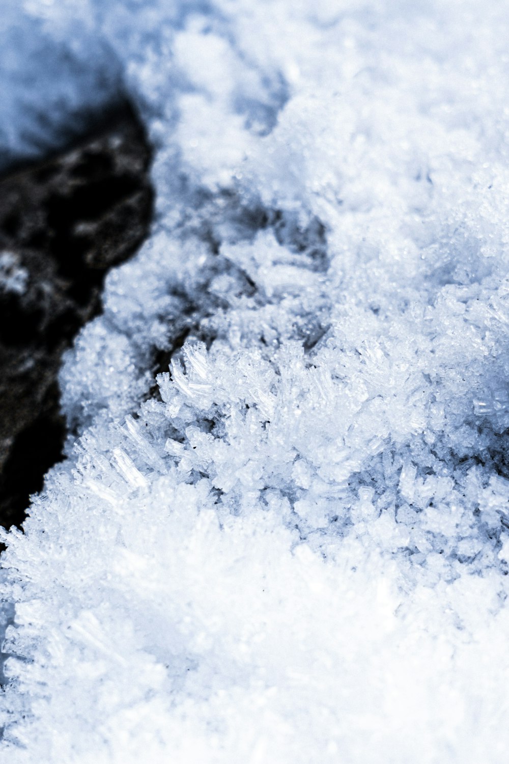 a close up of a snow covered ground