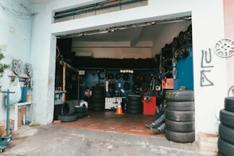 a garage filled with lots of tires and tires