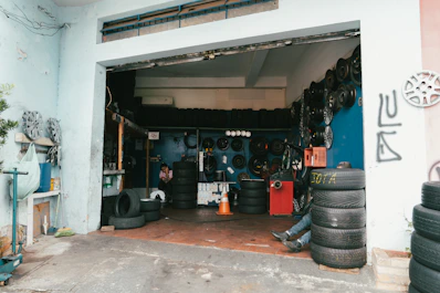 a garage filled with lots of tires and tires