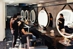 a woman getting her hair done in a salon