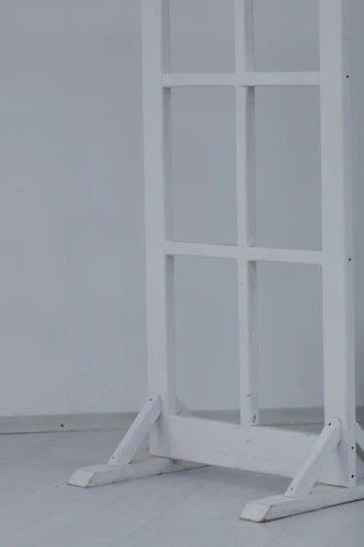 Sturdy fixed partition bracket holding a farmhouse-style wooden divider