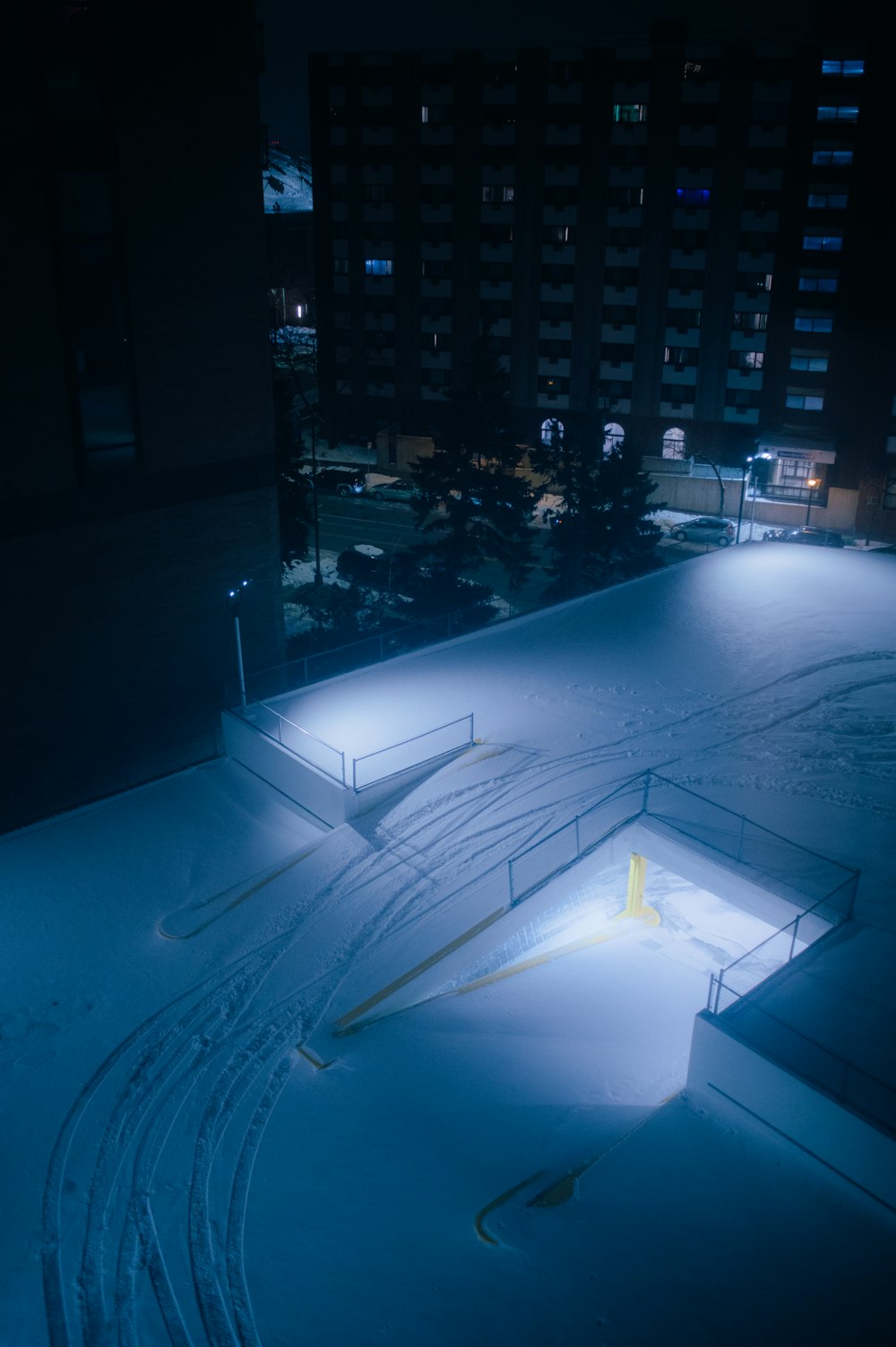 a night time view of a snow covered slope