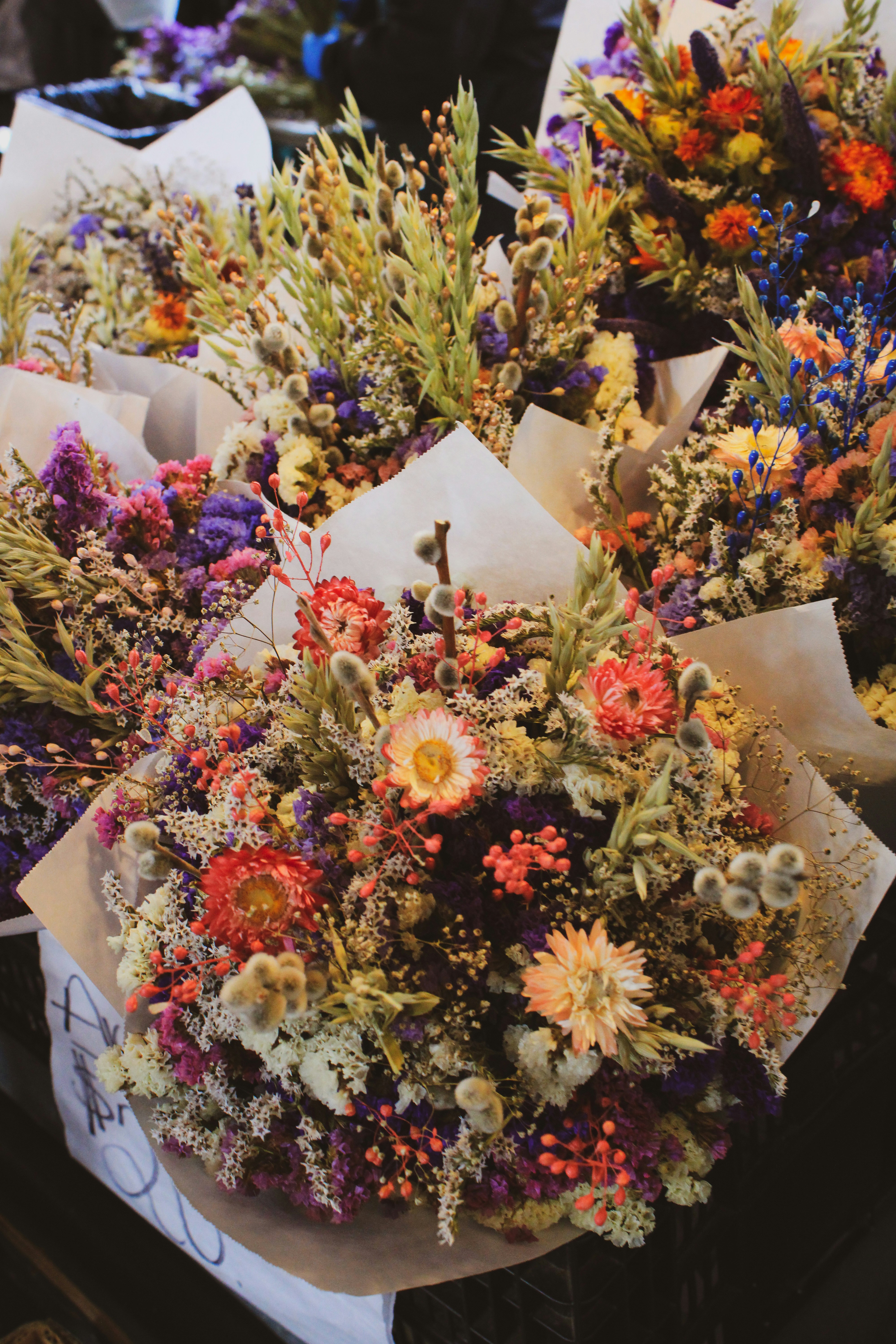 a bunch of flowers that are sitting on a table
