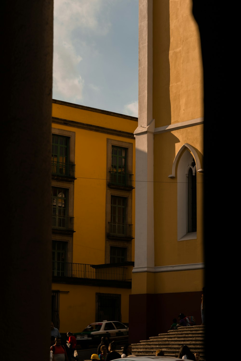 a tall clock tower towering over a city