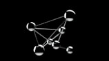 a black and white photo of a network of spheres