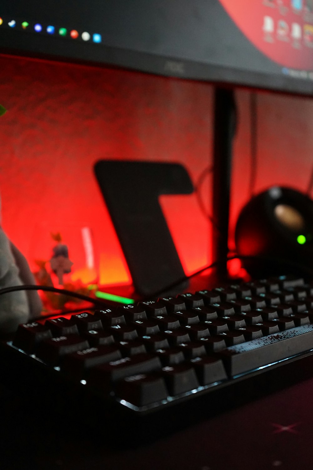 a computer keyboard sitting on top of a desk