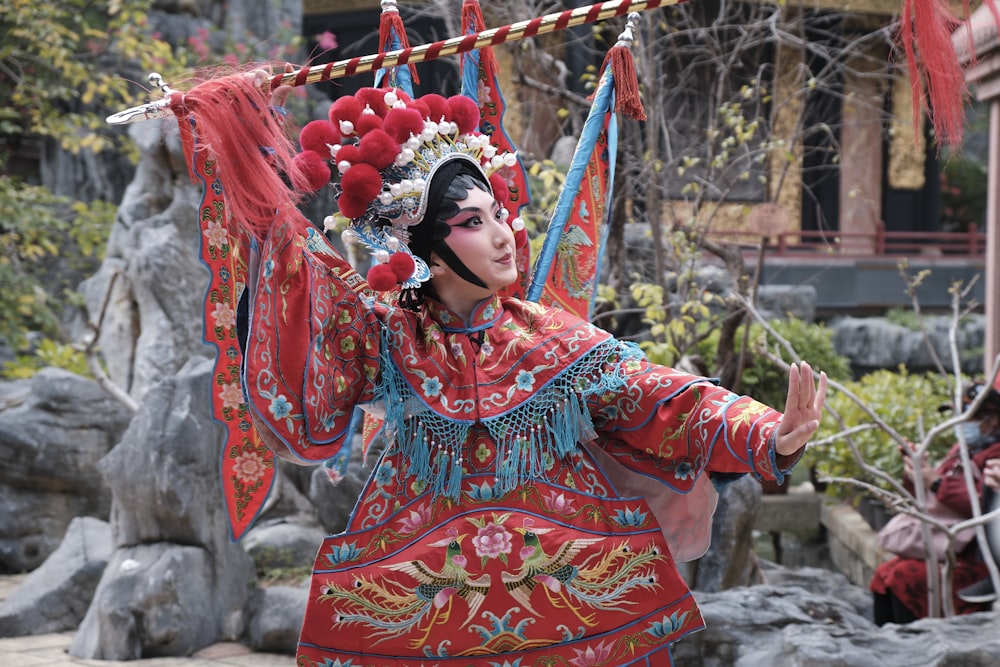 a woman in a red and blue costume