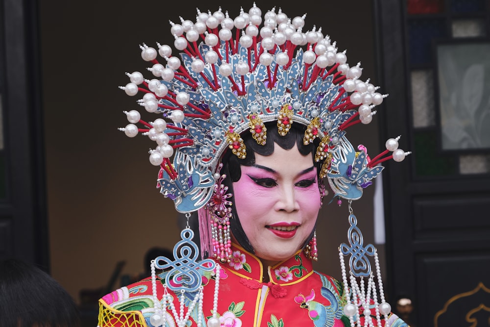 a woman in a chinese costume with elaborate decorations