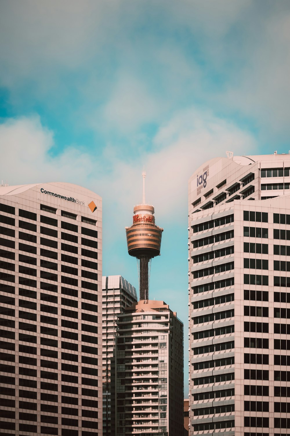 a very tall building with a tower in the middle of it