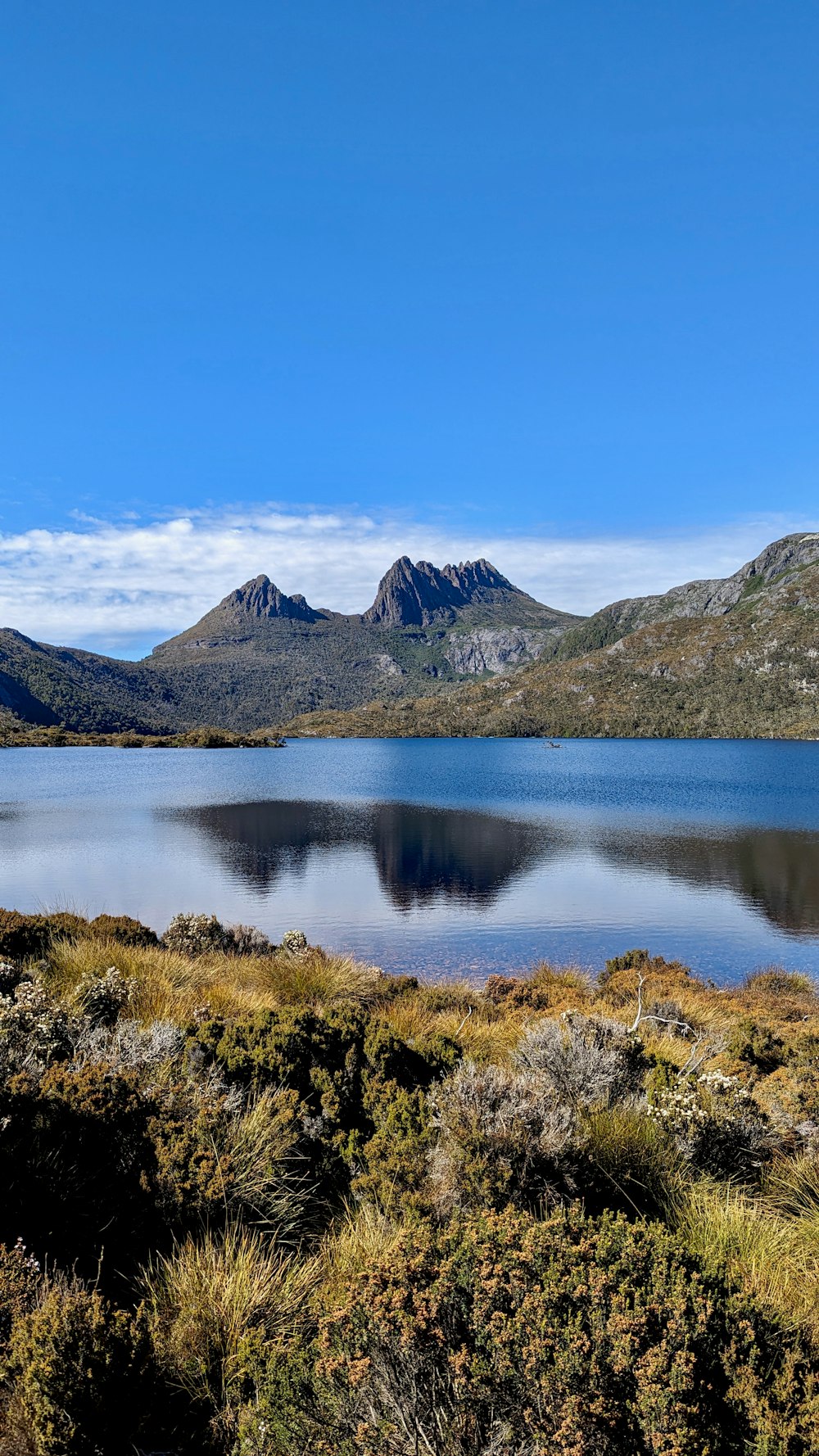 a large body of water surrounded by mountains