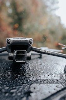 Close-up of a DJI Mavic 3T drone equipped with a high-resolution thermal camera flying over a rooftop.