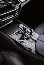 a close up of a steering wheel in a car