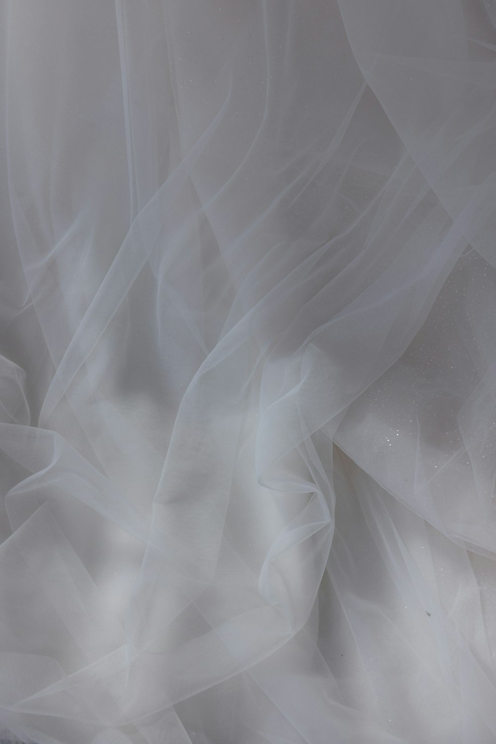 a close up view of a white dress