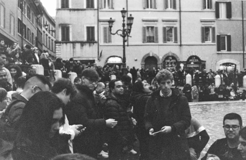 a group of people sitting around each other