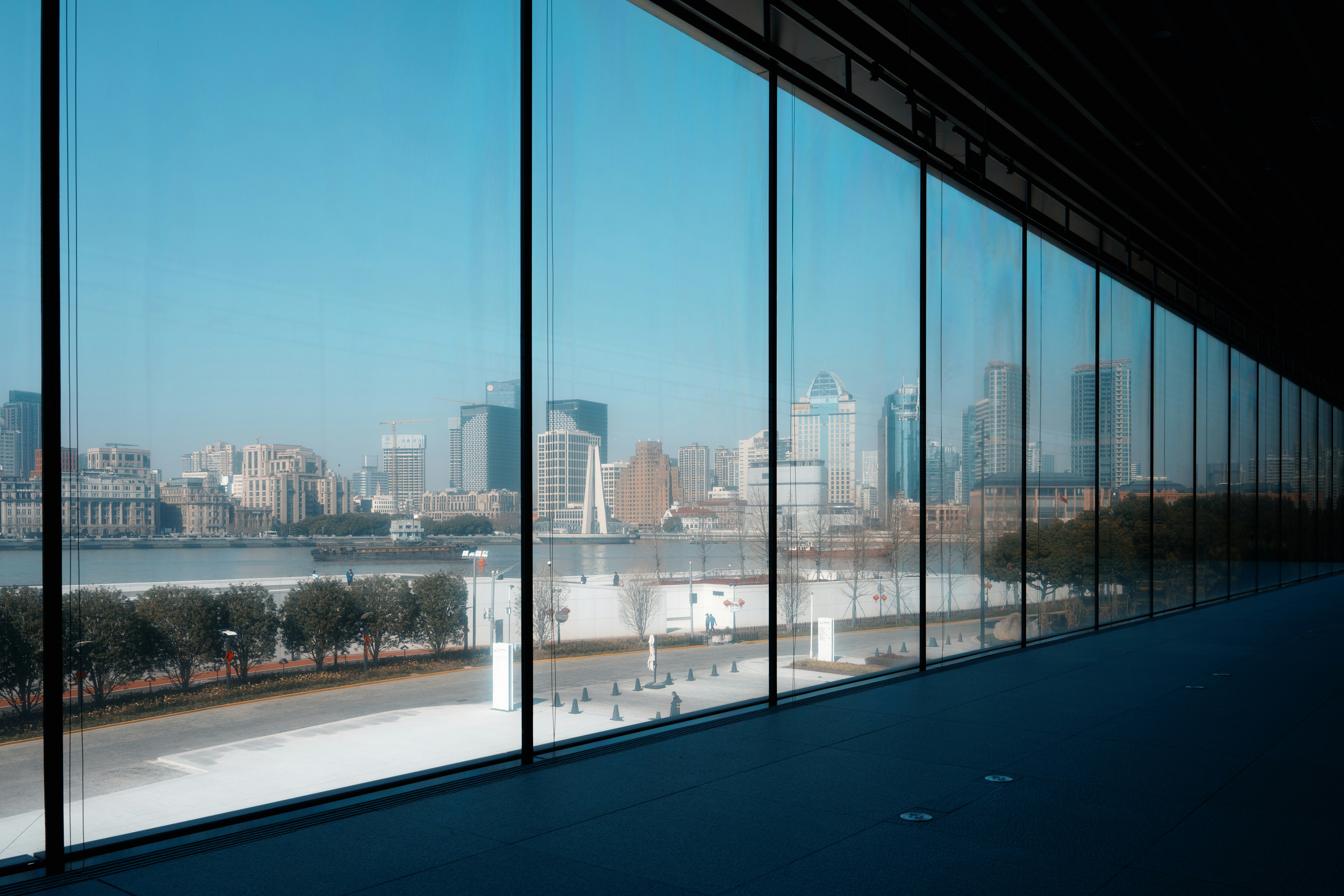 A state-of-the-art fitness center with floor-to-ceiling windows overlooking the Chicago River. - resort style apartments