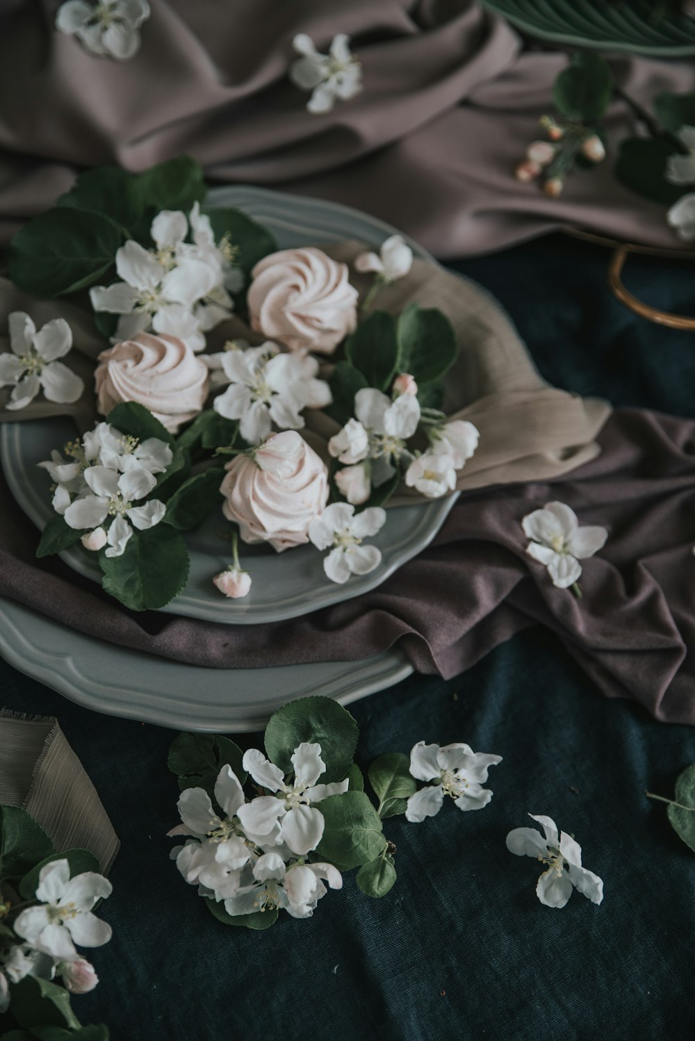 a plate with flowers on it on a table