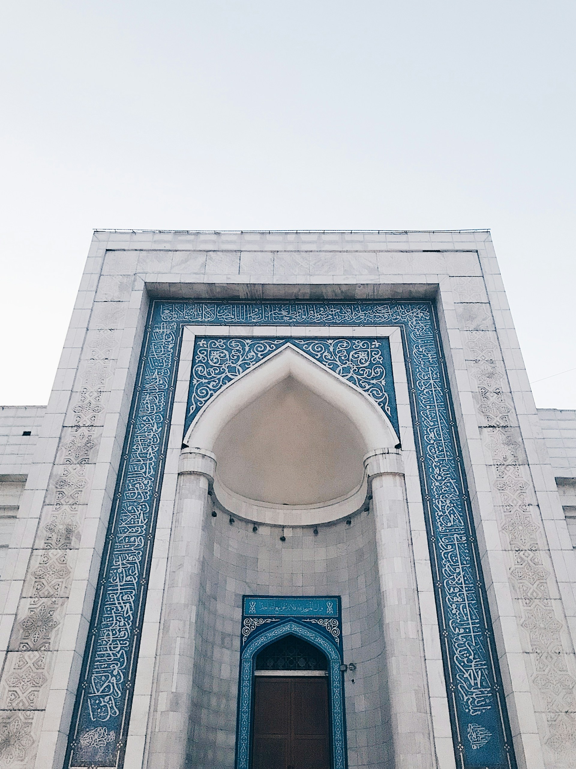 woman wearing yellow long-sleeved dress under white clouds and blue sky during daytime