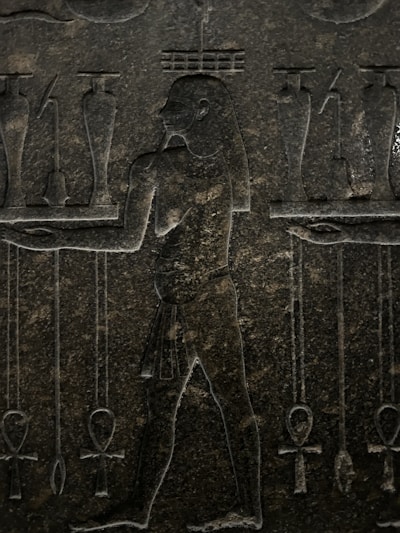 An ancient African scroll inscribed with symbolic motifs representing civilisational memory.