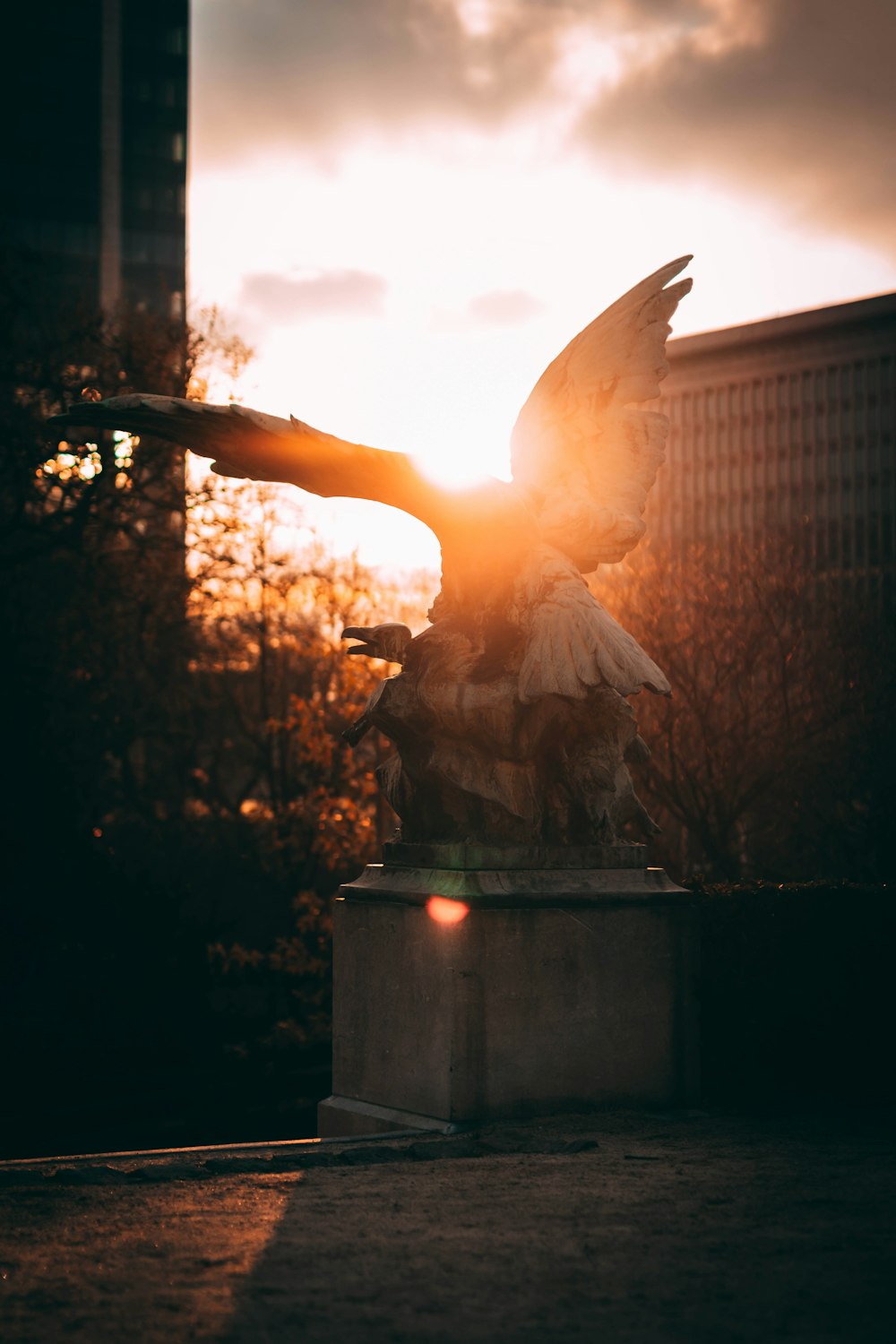 a statue of a bird with its wings spread