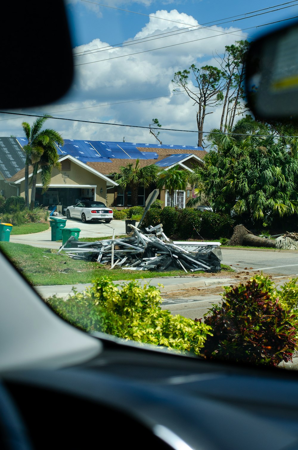 a view of a house through a car window