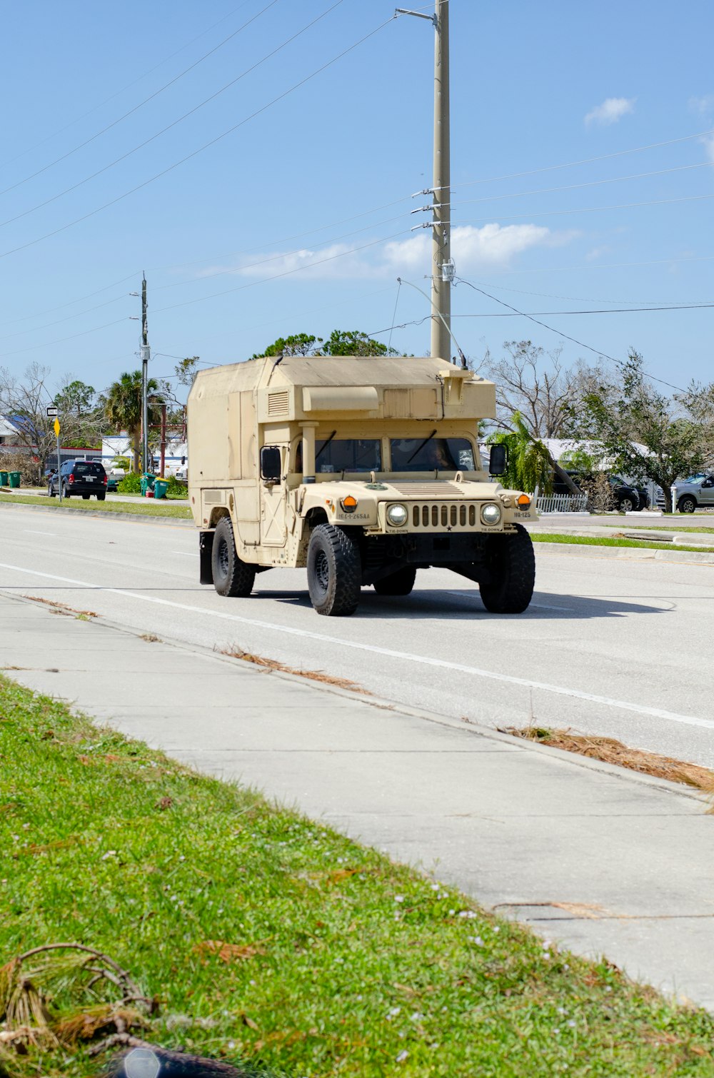 a military vehicle driving down the road