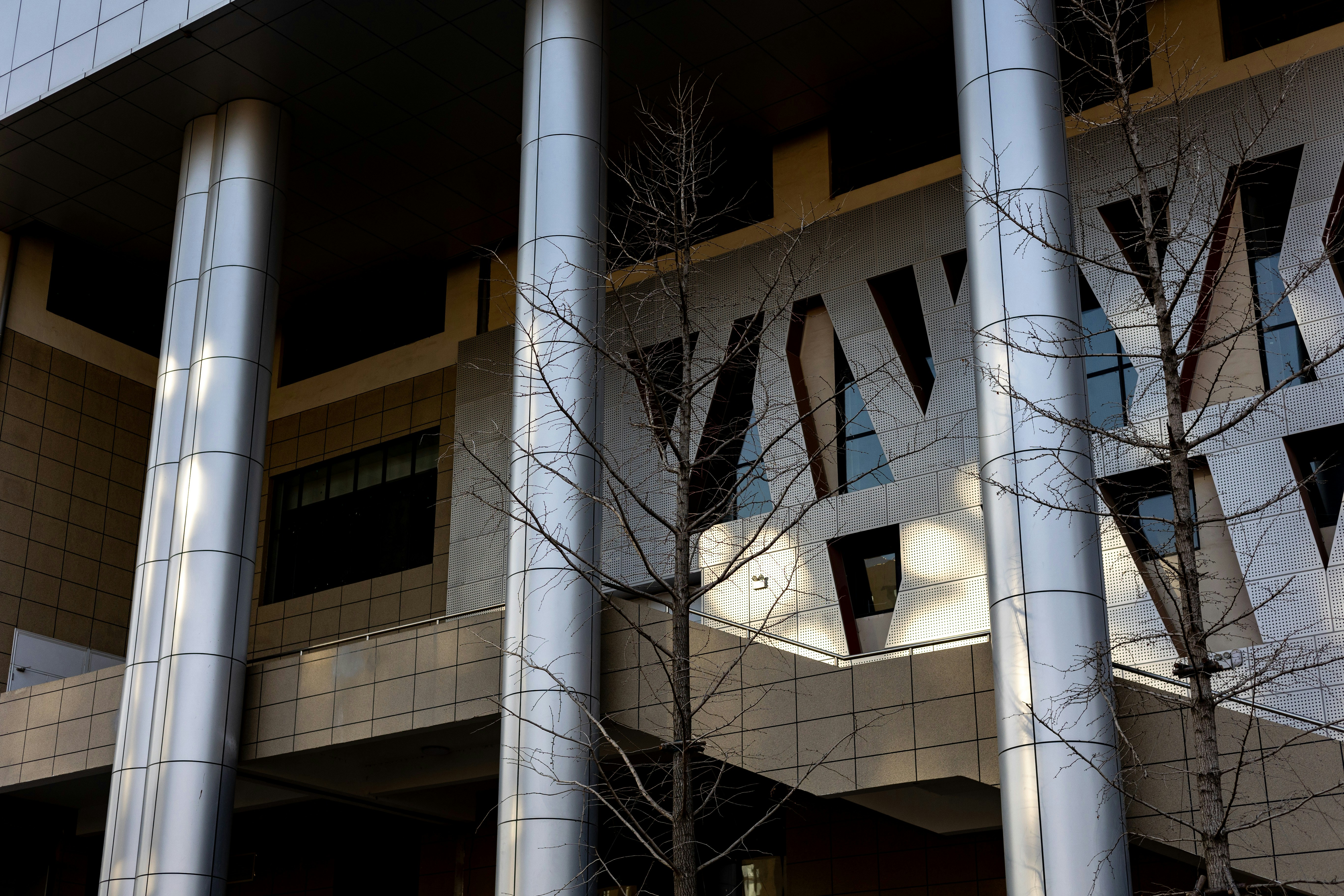 a tall building with a clock on the side of it